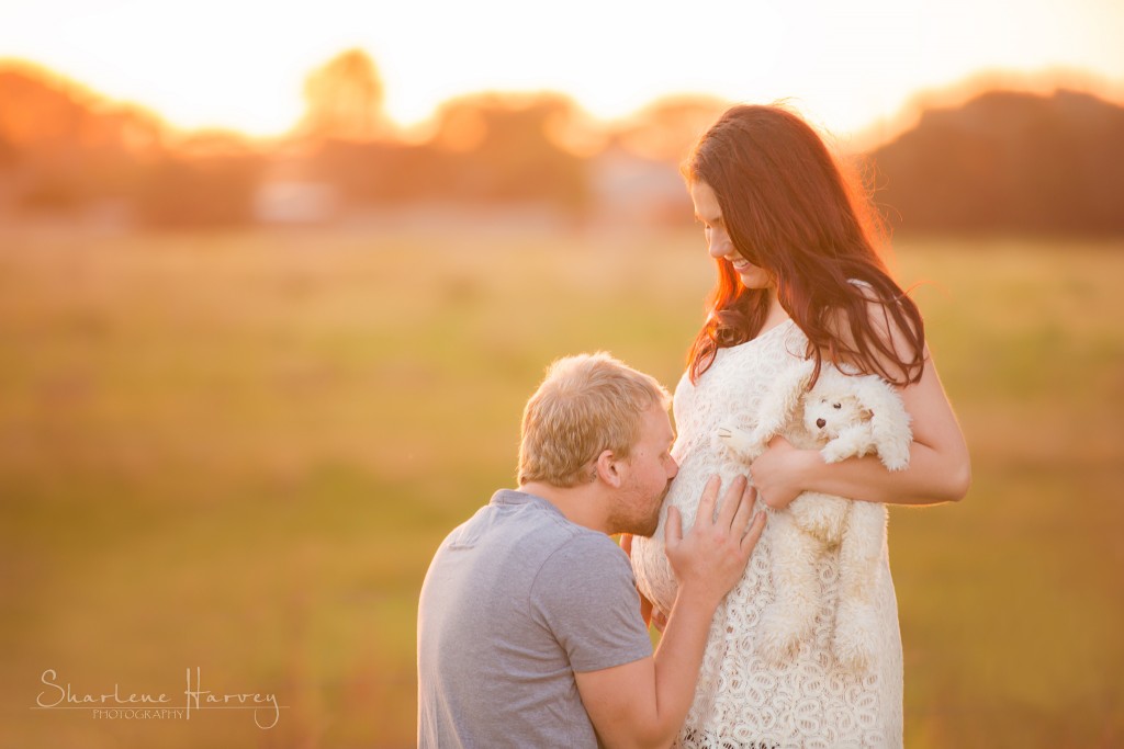 Father-to-be kisses pregnant wife baby-belly - Mornington Peninsula Maternity Photographer