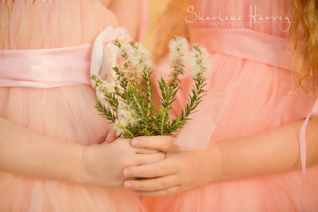 Children holding flowers